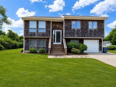 This attractive contemporary raised ranch in popular Eastward - photo 1