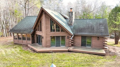 Escape to the ultimate log home sanctuary on nearly 75 pristine - photo 2