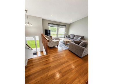 This attractive contemporary raised ranch in popular Eastward - photo 4