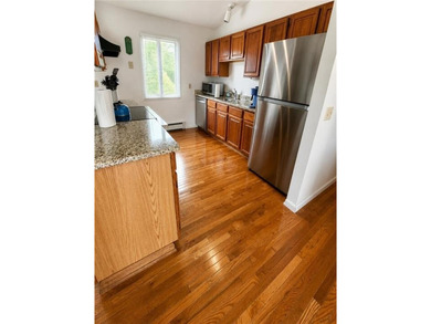 This attractive contemporary raised ranch in popular Eastward - photo 9