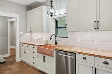 What a unique property! Situated on 2.24 acres just outside the - photo 9
