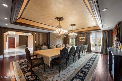 Beyond a private gated entrance and sweeping drive, this - photo 12