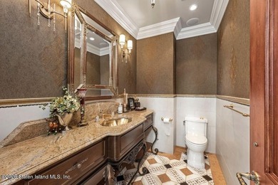 Beyond a private gated entrance and sweeping drive, this - photo 15