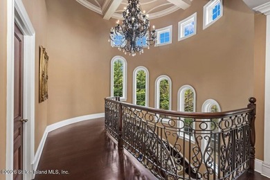 Beyond a private gated entrance and sweeping drive, this - photo 17