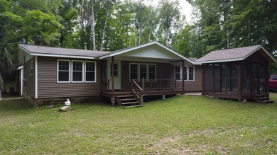 Enjoy year-round living on your 1.5 acres including 160 feet of - photo 1