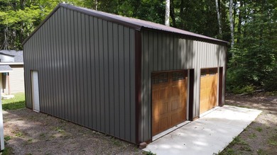 Enjoy year-round living on your 1.5 acres including 160 feet of - photo 3