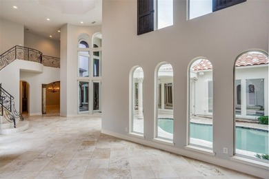 Stunning Mediterranean style home featuring 5 bedrooms, 3 living - photo 4