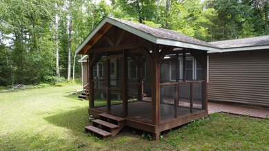 Enjoy year-round living on your 1.5 acres including 160 feet of - photo 6