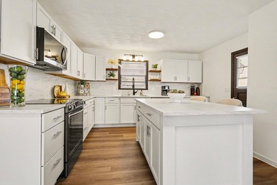 Absolutely stunning & completely updated ranch in Harper Creek - photo 10