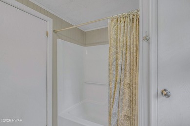 Nestled on a private second-tier lake lot, this charming ranch - photo 15