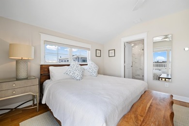Situated on a 60'x110' lot in the south end of Avalon, this Tom - photo 17