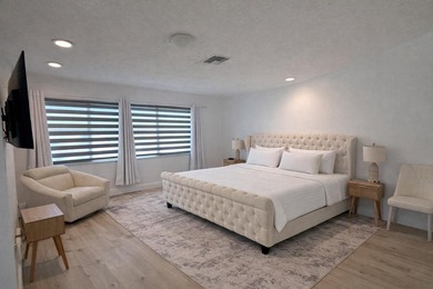 Stunning remodeled modern, spacious, and bright two-story condo - photo 17