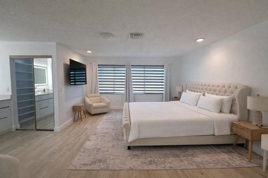 Stunning remodeled modern, spacious, and bright two-story condo - photo 20
