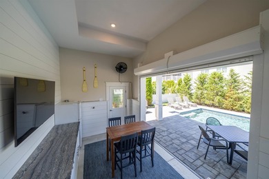 Situated on a 60'x110' lot in the south end of Avalon, this Tom - photo 26