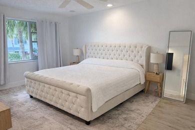 Stunning remodeled modern, spacious, and bright two-story condo - photo 26
