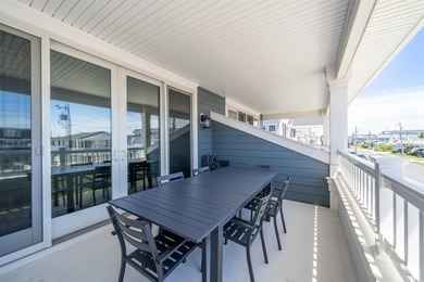 Situated on a 60'x110' lot in the south end of Avalon, this Tom - photo 28
