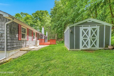 Nestled on a private second-tier lake lot, this charming ranch - photo 31