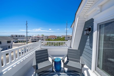 Situated on a 60'x110' lot in the south end of Avalon, this Tom - photo 33