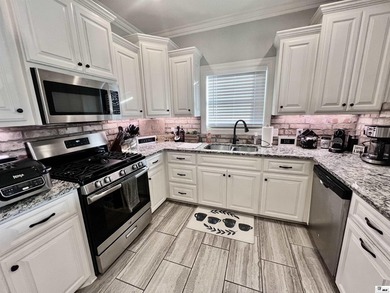 This house is located on a very quiet street tucked back onto - photo 5