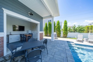 Situated on a 60'x110' lot in the south end of Avalon, this Tom - photo 36