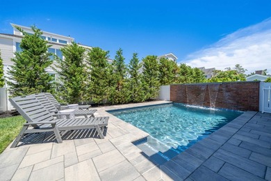 Situated on a 60'x110' lot in the south end of Avalon, this Tom - photo 41