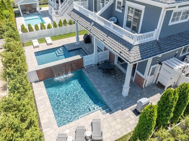 Situated on a 60'x110' lot in the south end of Avalon, this Tom - photo 42