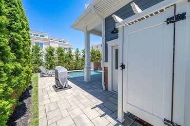 Situated on a 60'x110' lot in the south end of Avalon, this Tom - photo 43