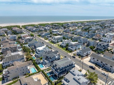 Situated on a 60'x110' lot in the south end of Avalon, this Tom - photo 44