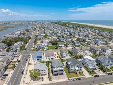 Situated on a 60'x110' lot in the south end of Avalon, this Tom - photo 46