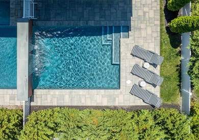Situated on a 60'x110' lot in the south end of Avalon, this Tom - photo 48