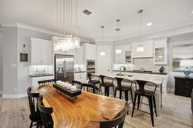 Welcome to this beautiful 3-story, FURNISHED, former model home