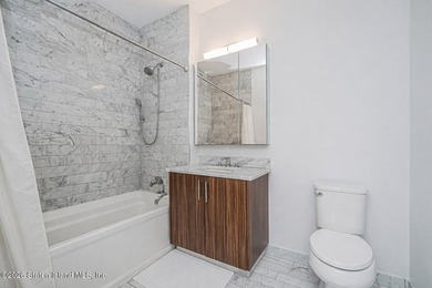 Unit 21B is a one-bedroom, one-bathroom, north-facing unit with - photo 15