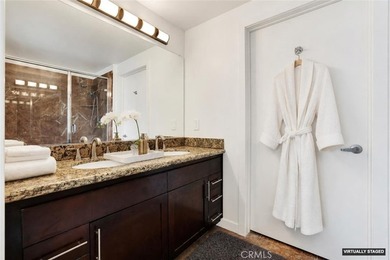 Welcome to Unit 1203 at West Ocean Tower, a modern high-rise - photo 17