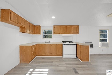Escape to the peace and tranquility of this charming 3-bedroom - photo 12
