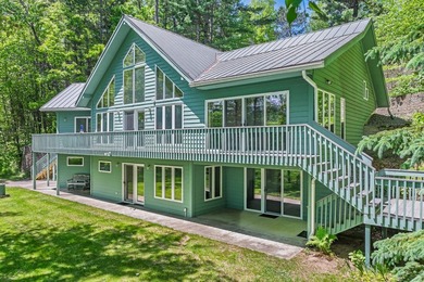 Welcome to this spacious Northwoods waterfront retreat on - photo 1