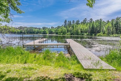 Welcome to this spacious Northwoods waterfront retreat on - photo 2