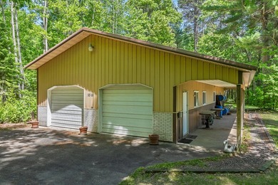 Welcome to this spacious Northwoods waterfront retreat on - photo 4