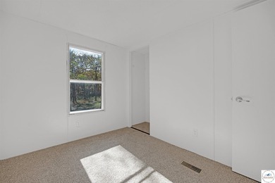 Escape to the peace and tranquility of this charming 3-bedroom - photo 24