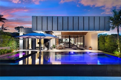 Located within a 24/7 guarded waterfront enclave and less than - photo 1