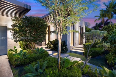 Located within a 24/7 guarded waterfront enclave and less than - photo 2