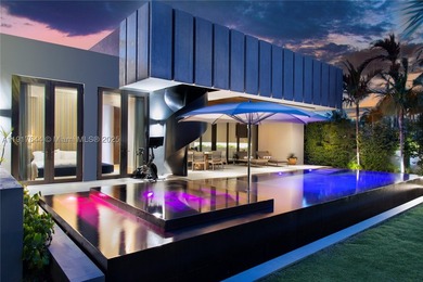 Located within a 24/7 guarded waterfront enclave and less than - photo 3