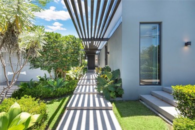 Located within a 24/7 guarded waterfront enclave and less than - photo 5