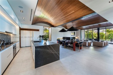 Located within a 24/7 guarded waterfront enclave and less than - photo 7