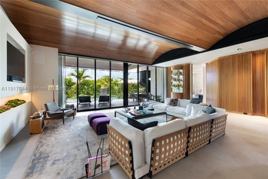 Located within a 24/7 guarded waterfront enclave and less than - photo 9