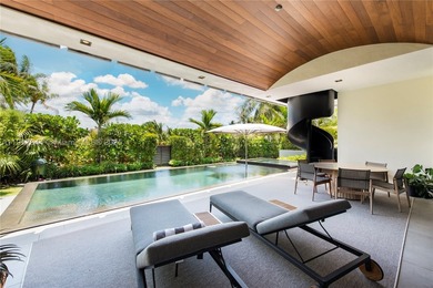 Located within a 24/7 guarded waterfront enclave and less than - photo 10