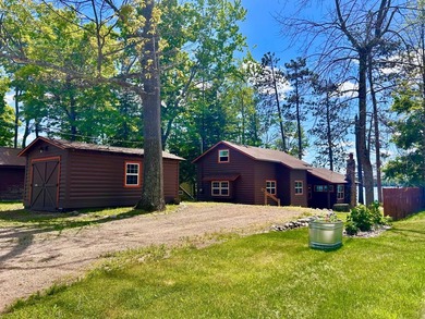 GORGEOUS LAKE HOME WITH PREMIER SANDY FRONTAGE ON - photo 3