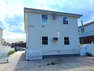 Welcome to this spacious two-family home nestled in the heart of - photo 13