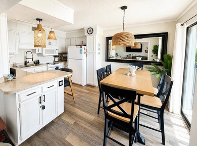 Wake up to sparkling Atlantic Ocean views in this cheerful - photo 9