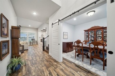 The stunning custom-built 4-bedroom home is perfectly nestled in