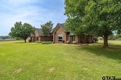 Set on over 2.5 beautifully landscaped acres, this stunning - photo 2